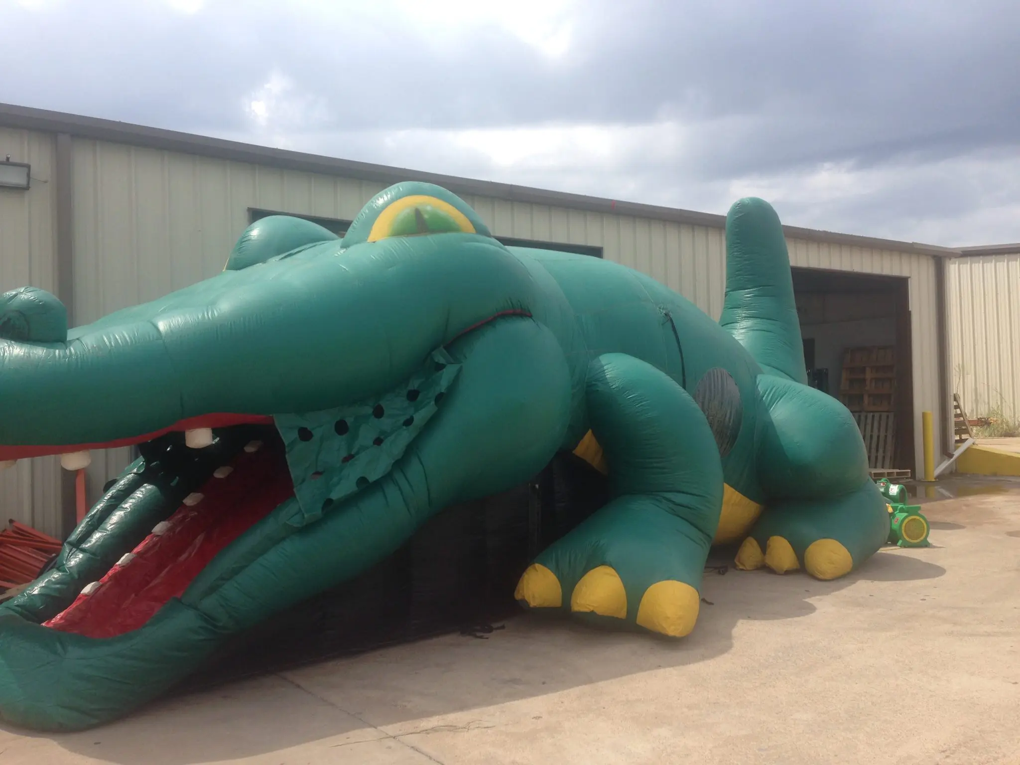 Gator hide and slide inflatable water slide rental in Frisco Texas