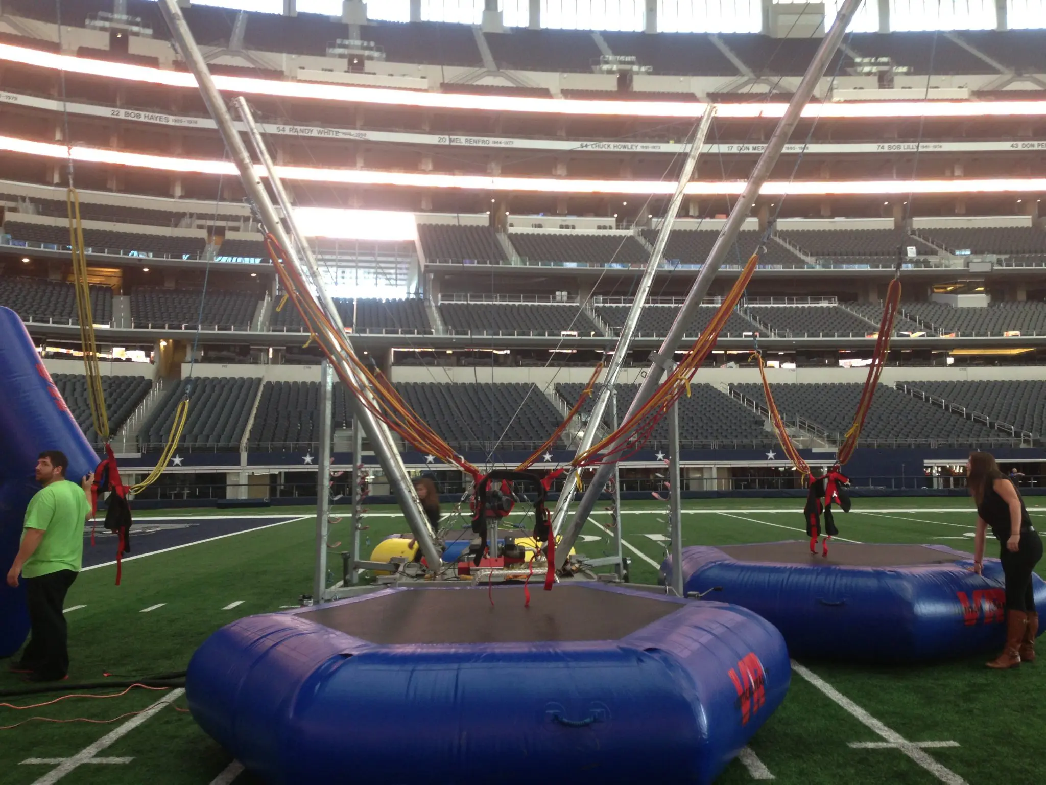 Bungee trampoline unique game rental at a Frisco corporate family day