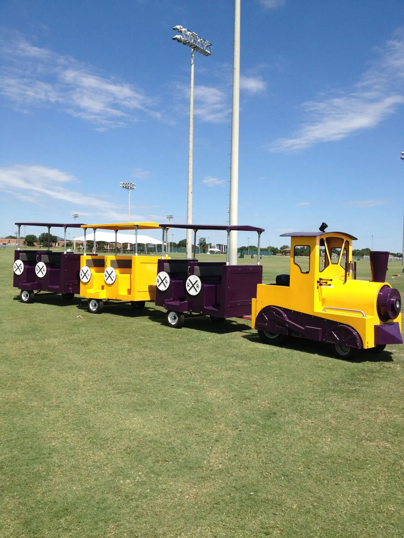 Trackless train rental with locomotive and four wagons at a Dallas Fort Worth neighborhood event