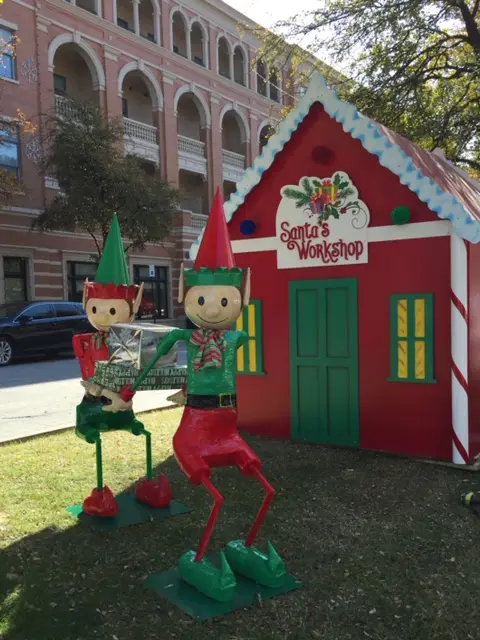 Elf-themed Christmas inflatable rental at a DFW holiday party