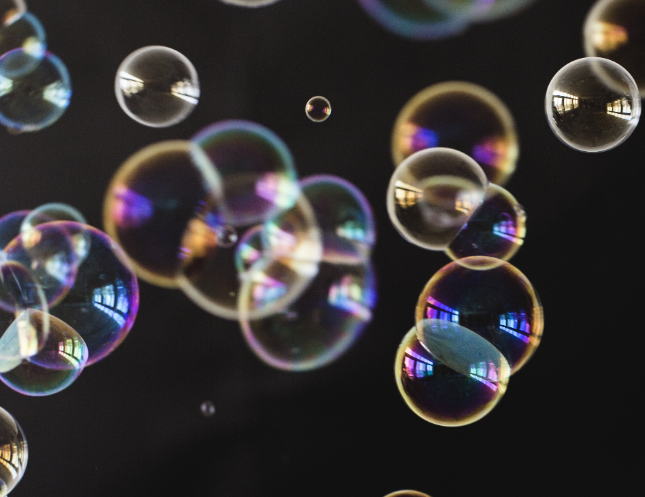 Commercial hurricane bubble machine rental producing a wall of bubbles at a Dallas Fort Worth wedding reception