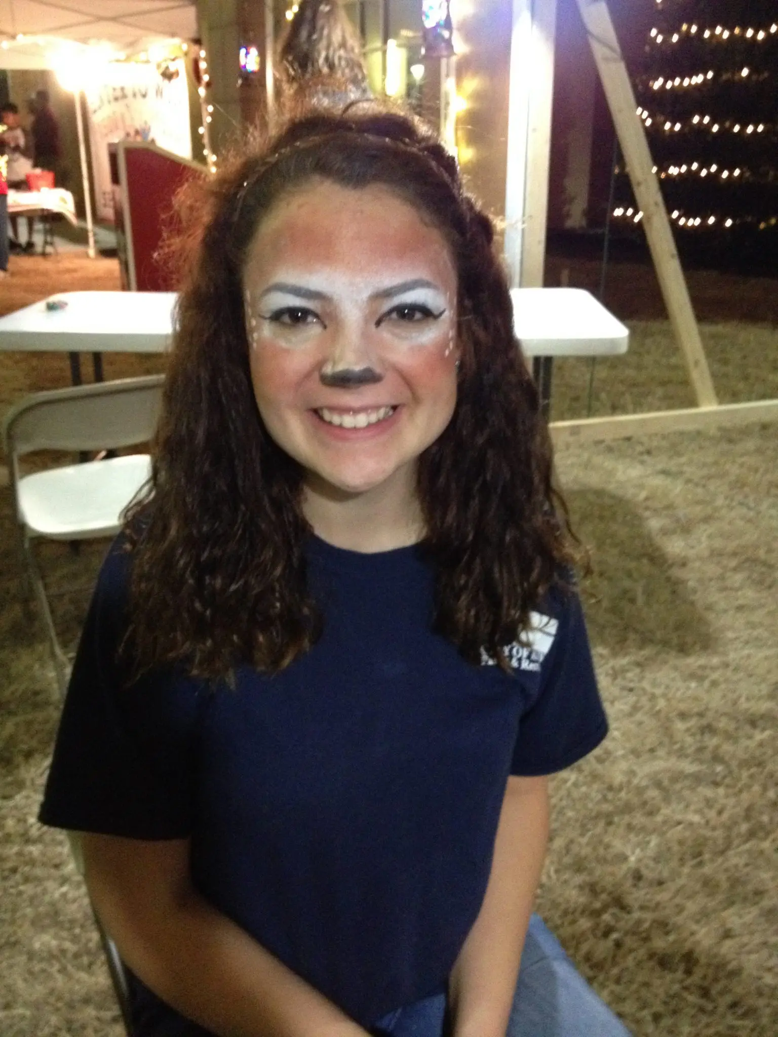 Face painter working a birthday party in Frisco, Texas