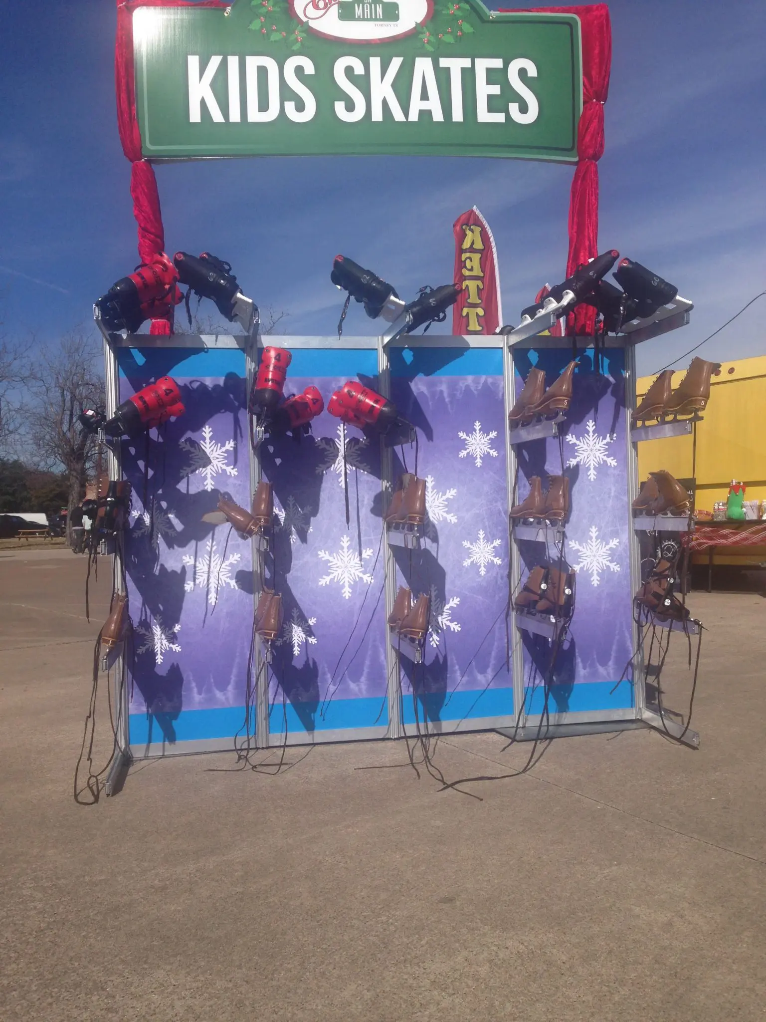 Synthetic ice rink package with skates and dasher boards in the Dallas Fort Worth area